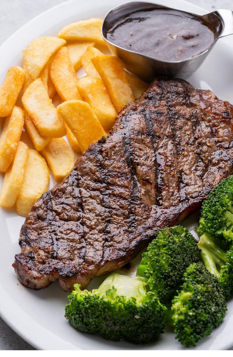 NY strip steak and fries — Sami's Marco Island dinner menu